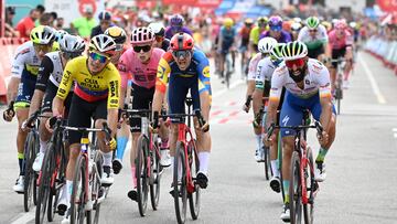 Team Totalenergies' French rider Geoffey Soupe (R) crosses the finish line in first place followed by second placed Team Caja Rural-Seguros RGA's Venezuelan rider Orluis Alberto Aular Sanabria (3L) adn Team Trek's Belgian rider Edward Theuns (C) during the 7th stage of the 2023 La Vuelta cycling tour of Spain, a 201 km race from Utiel to Oliva, on September 1, 2023. (Photo by JOSE JORDAN / AFP)