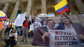 People demonstrate against a tax reform proposed by the government of leftist President Gustavo Petro, in Bogota, on September 26, 2022. - The 62-year-old former guerrilla and one-time mayor Petro, took over on August 7 with plans for profound reforms in a country beset by economic inequality and drug violence. (Photo by Raul ARBOLEDA / AFP) (Photo by RAUL ARBOLEDA/AFP via Getty Images)