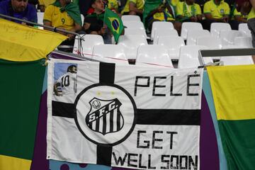 Fans of Brazil with a message saying Pele, Get Well Soon 