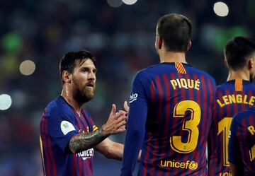 Soccer Football - Spanish Super Cup - Barcelona v Sevilla - Grand Stade de Tanger, Tangier, Morocco - August 12, 2018   Barcelona's Gerard Pique celebrates scoring their first goal with Lionel Messi    REUTERS/Jon Nazca