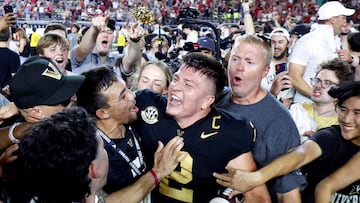 Oct 5, 2024; Nashville, Tennessee, USA; Vanderbilt Commodores quarterback Diego Pavia celebrates with fans after defeating the Alabama Crimson Tide at FirstBank Stadium. Mandatory Credit: Butch Dill-Imagn Images TPX IMAGES OF THE DAY