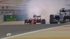 Vettel, con el humo en su Ferrari.