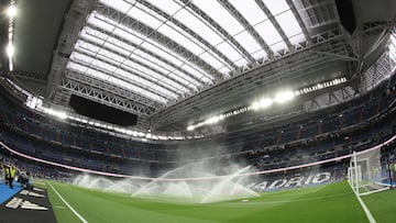 (FILES) Picture shows a general view of the Santiago Bernabeu stadium with its operable roof closed due to the rainy weather ahead of the Spanish Liga football match between Real Madrid CF and Getafe CF in Madrid on September 2, 2023. The NFL will play a regular season game at Real Madrid's Santiago Bernabeu Stadium during the 2025 season, the league said on February 9, 2024. (Photo by Thomas COEX / AFP)