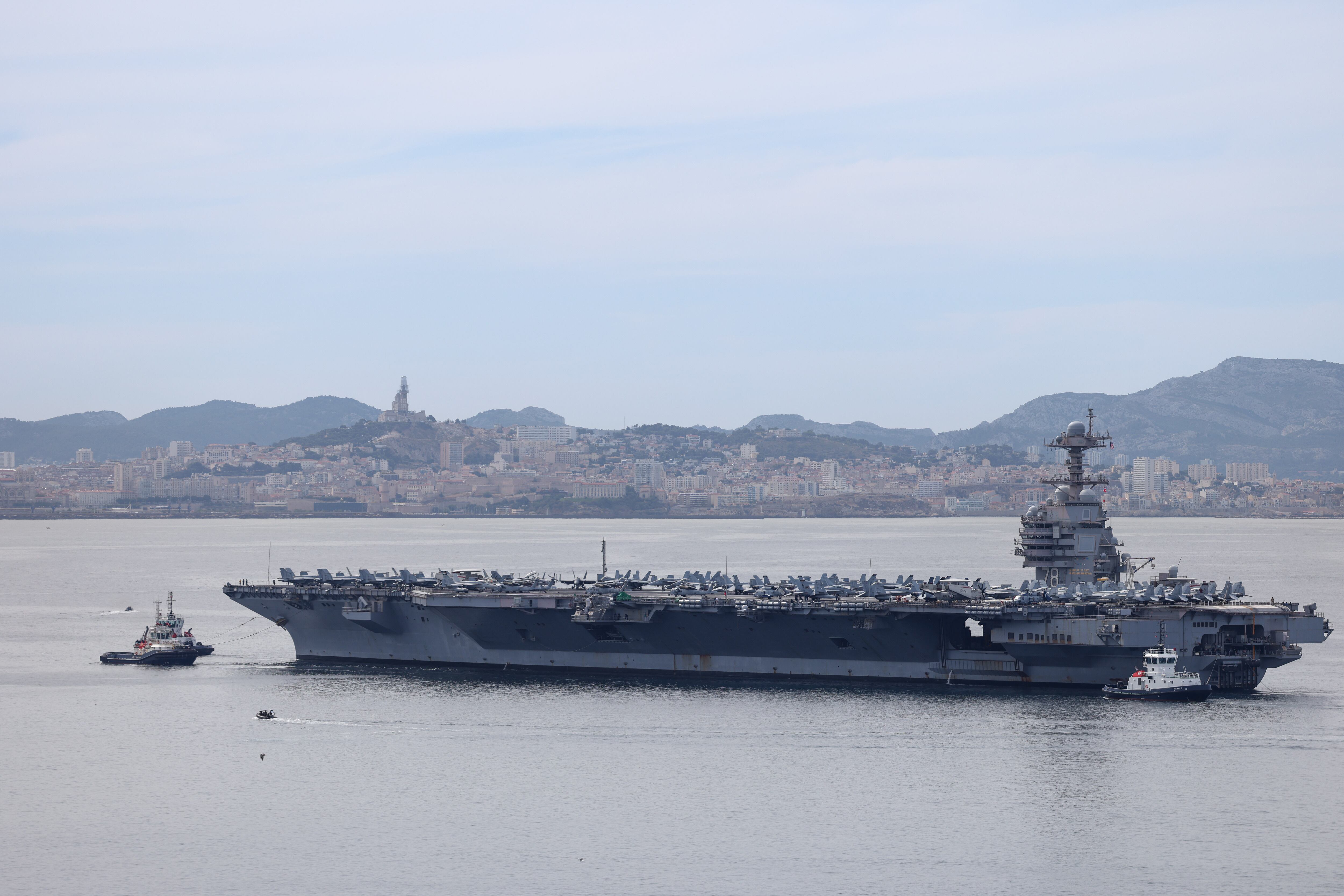 MARSEILLE, FRANCE - 2025/08/04: View of the aircraft carrier USS Gerald R. Ford arriving at the Port of Marseille. The world's largest nuclear-powered aircraft carrier, the USS Gerald R. Ford, arrives at the Port of Marseille, France, for a one-week port visit. (Photo by Denis Thaust/SOPA Images/LightRocket via Getty Images)