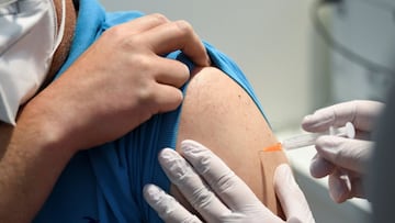 A man receives his shot at a vaccination center offering the AstraZeneca vaccine, as the number of the coronavirus disease (COVID-19) infections decreases in Munich, Germany, May 13, 2021. REUTERS/Andreas Gebert