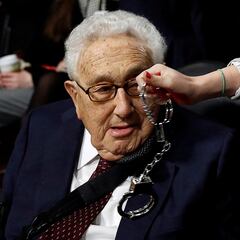 Why was Henry Kissinger considered a war criminal by some?