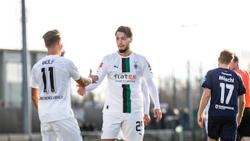 MOENCHENGLADBACH, GERMANY - JANUARY 07: Ramy Bensebaini of Borussia Moenchengladbach celebrates with teammates after scoring the team's first goal during a friendly match between Borussia Moenchengladbach and VfB Oldenburg at FohlenPlatz im Borussia-Park on January 7, 2023 in Moenchengladbach, Germany. (Photo by Christian Verheyen/Borussia Moenchengladbach via Getty Images)