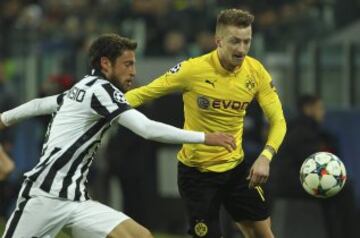 Marco Reuss del Borussia Dortmund  y Claudio Marchisio de la Juventus