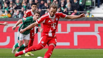 Bayern Munich's English forward #09 Harry Kane scores the opening goal from the penalty spot during the German first division Bundesliga football match between SV Werder Bremen and FC Bayern Munich in Bremen, northern Germany February 14, 2026. (Photo by Focke Strangmann / AFP) / DFL REGULATIONS PROHIBIT ANY USE OF PHOTOGRAPHS AS IMAGE SEQUENCES AND/OR QUASI-VIDEO