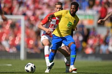 Fred vies with Croatia midfielder Filip Bradaric during Brazil's friendly win over Croatia at Anfield on Sunday.