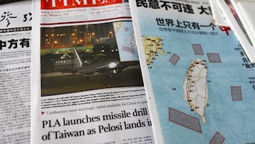 A map showing locations where Chinese People's Liberation Army (PLA) will conduct military exercises and training activities including live-fire drills is seen on newspaper reports of U.S. House of Representatives Speaker Nancy Pelosi's visit to Taiwan, at a newsstand in Beijing, China August 3, 2022. REUTERS/Tingshu Wang