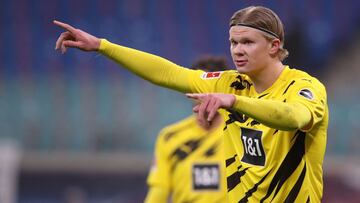 Dortmund's Norwegian forward Erling Braut Haaland gestures during the German first division Bundesliga football match RB Leipzig vs Borussia Dortmund in Leipzig, on January 9, 2021. (Photo by Ronny HARTMANN / various sources / AFP) / DFL REGULATIONS