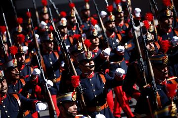 Military members participate in a parade to mark the country's National Day, in Madrid, Spain, October 12, 2022. REUTERS/Juan Medina