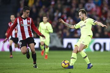 Ivan Rakitic y Mikel San José. 