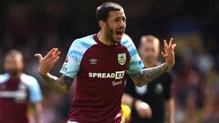 WATFORD, ENGLAND - APRIL 30: Dwight McNeil of Burnley reacts during the Premier League match between Watford and Burnley at Vicarage Road on April 30, 2022 in Watford, England. (Photo by Julian Finney/Getty Images)