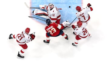 SUNRISE, FLORIDA - MAY 24: Pyotr Kochetkov #52 of the Carolina Hurricanes makes a save on Carter Verhaeghe #23 of the Florida Panthers in Game Three of the Eastern Conference Final of the 2025 Stanley Cup Playoffs at Amerant Bank Arena on May 24, 2025 in Sunrise, Florida. Carmen Mandato/Getty Images/AFP (Photo by Carmen Mandato / GETTY IMAGES NORTH AMERICA / Getty Images via AFP)