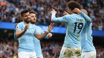 Manchester City&#039;s Argentinian striker Sergio Aguero (L) celebrates after scoring with Manchester City&#039;s German midfielder Leroy Sane during the English Premier League football match between Manchester City and Crystal Palace at the Etihad Stadium in Manchester, north west England, on September 23, 2017.  / AFP PHOTO / Oli SCARFF / RESTRICTED TO EDITORIAL USE. No use with unauthorized audio, video, data, fixture lists, club/league logos or &#039;live&#039; services. Online in-match use limited to 75 images, no video emulation. No use in betting, games or single club/league/player publications.  / 