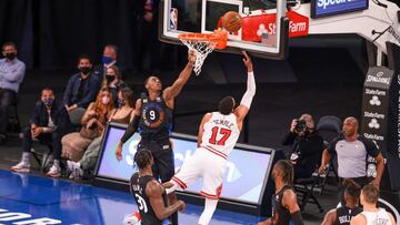 Apr 28, 2021; New York, New York, USA; Chicago Bulls forward Garrett Temple (17) shoots the ball against New York Knicks guard RJ Barrett (9) during the second quarter at Madison Square Garden. Mandatory Credit: Vincent Carchietta-USA TODAY Sports