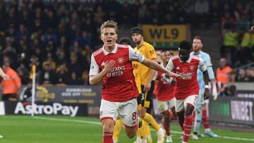 WOLVERHAMPTON, ENGLAND - NOVEMBER 12: Martin Odegaard celebrates scoring the 1st Arsenal goal during the Premier League match between Wolverhampton Wanderers and Arsenal FC at Molineux on November 12, 2022 in Wolverhampton, England. (Photo by Stuart MacFarlane/Arsenal FC via Getty Images)