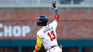 ATLANTA, GA - JUNE 27: Ronald Acuna Jr. #13 of the Atlanta Braves reacts as he rounds first base following a leadoff home run during the first inning against the Minnesota Twins at Truist Park on June 27, 2023 in Atlanta, Georgia.   Todd Kirkland/Getty Images/AFP (Photo by Todd Kirkland / GETTY IMAGES NORTH AMERICA / Getty Images via AFP)