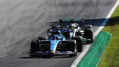 MONZA, ITALY - SEPTEMBER 11: Fernando Alonso of Spain driving the (14) Alpine F1 A522 Renault leads Lewis Hamilton of Great Britain driving the (44) Mercedes AMG Petronas F1 Team W13 during the F1 Grand Prix of Italy at Autodromo Nazionale Monza on September 11, 2022 in Monza, Italy. (Photo by Joe Portlock - Formula 1/Formula 1 via Getty Images)