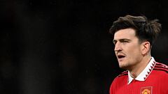 Manchester United's English defender Harry Maguire reacts during the English League Cup semi-final second-leg  football match between Manchester United and Nottingham Forest at Old Trafford in Manchester, north west England, on February 1, 2023. (Photo by Paul ELLIS / AFP) / RESTRICTED TO EDITORIAL USE. No use with unauthorized audio, video, data, fixture lists, club/league logos or 'live' services. Online in-match use limited to 120 images. An additional 40 images may be used in extra time. No video emulation. Social media in-match use limited to 120 images. An additional 40 images may be used in extra time. No use in betting publications, games or single club/league/player publications. / 