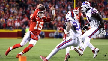 KANSAS CITY, MISSOURI - JANUARY 23: Patrick Mahomes #15 of the Kansas City Chiefs runs with the ball against the Buffalo Bills during the fourth quarter in the AFC Divisional Playoff game at Arrowhead Stadium on January 23, 2022 in Kansas City, Missouri.