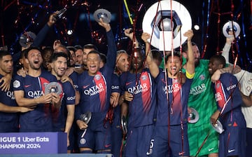 PSG
 
Achraf Hakimi, Goncalo Ramos, Carlos Soler, Kylian Mbappe, Danilo Pereira, Marquinhos, Gianluigi Donnarumma, Ousmane Dembele of PSG and teammates during the trophy ceremony celebrating the 12th French Ligue 1 championships title won by PSG following the Ligue 1 Uber Eats match between Paris Saint-Germain (PSG) and Toulouse FC (Tefece, TFC) at Parc des Princes stadium on May 12, 2024 in Paris, France.(Photo by Jean Catuffe/Getty Images)