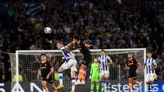 Real Sociedad's Norwegian forward Alexander Sorloth (L) vies with Valencia's Turkish defender Cenk Ozkacar during the Spanish league football match between Real Sociedad and Valencia CF at the Anoeta stadium in San Sebastian on November 6, 2022. - The match ended 1-1. (Photo by ANDER GILLENEA / AFP) (Photo by ANDER GILLENEA/AFP via Getty Images)