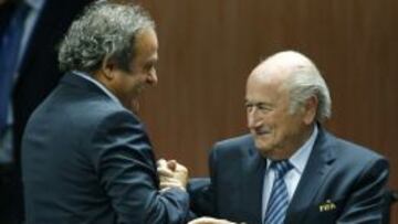 Platini, con Blatter.