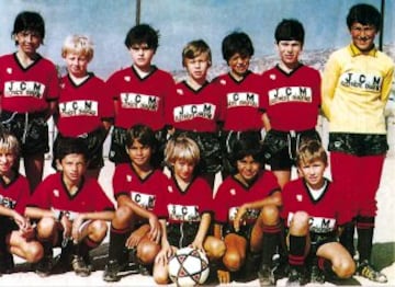 Zidane (back row, second right) as a youth player at Cannes, his first professional club.