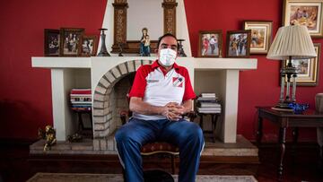 Peru's presidential candidate for the "Accion Popular" party Yonhy Lescano speaks during an interview with AFP at his home in Lima, on March 13, 2021. - Center-right wing Lescano, who leads the polls for next April 11 election in Peru, told AFP that if he wins, he will call for a referendum to change the Constitution and correct an "unlimited" liberal economy that enriches a minority and broadens social gaps. (Photo by ERNESTO BENAVIDES / AFP)