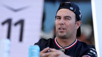 Cadillac's Mexican driver Sergio Perez looks on ahead of the Formula One Australian Grand Prix at Melbourne�s Albert Park on March 5, 2026. (Photo by Martin KEEP / AFP) / -- IMAGE RESTRICTED TO EDITORIAL USE - STRICTLY NO COMMERCIAL USE --