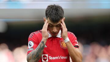 Soccer Football - Premier League - Manchester City v Manchester United - Etihad Stadium, Manchester, Britain - October 2, 2022 Manchester United's Lisandro Martinez looks dejected after Manchester City's Erling Braut Haaland scores their third goal Action Images via Reuters/Carl Recine EDITORIAL USE ONLY. No use with unauthorized audio, video, data, fixture lists, club/league logos or 'live' services. Online in-match use limited to 75 images, no video emulation. No use in betting, games or single club /league/player publications.  Please contact your account representative for further details.