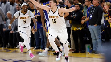 Nikola Jokic hit a half court shot to beat the buzzer and complete a massive Denver Nuggets fourth quarter comeback to sink the Golden State Warriors.