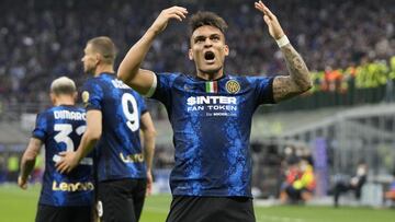 Inter Milan's Lautaro Martinez celebrates after scoring his side's third goal during the Serie A soccer match between Inter Milan and Roma at the San Siro Stadium, in Milan, Italy, Saturday, April 23, 2022. (AP Photo/Antonio Calanni)