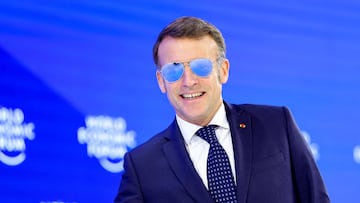 France's President Emmanuel Macron wears sunglasses as he attends the 56th annual World Economic Forum (WEF) meeting in Davos, Switzerland, January 20, 2026. REUTERS/Denis Balibouse