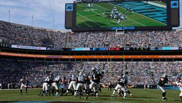 CHARLOTTE, NC - DECEMBER 13: Cam Newton #1 hands the ball off to teammate Jonathan Stewart #28 of the Carolina Panthers against the Atlanta Falcons in the 1st quarter during their game at Bank of America Stadium on December 13, 2015 in Charlotte, North Carolina. Streeter Lecka/Getty Images/AFP
== FOR NEWSPAPERS, INTERNET, TELCOS & TELEVISION USE ONLY ==