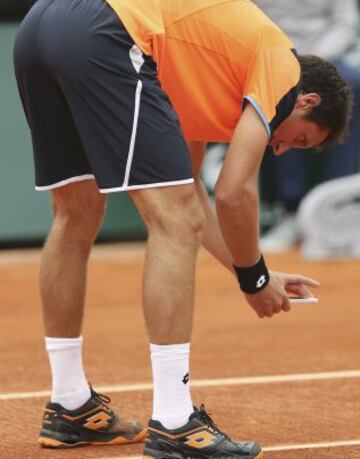 Sergiy Stakhovsky hace una foto durante su partido cintra Richard Gasquet .