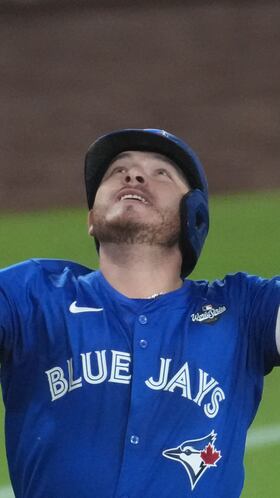 Oct 27, 2025; Los Angeles, California, USA; Toronto Blue Jays catcher Alejandro Kirk (30) celebrates after hitting a three-run home run during the fourth inning against the Los Angeles Dodgers in game three of the 2025 MLB World Series at Dodger Stadium. Mandatory Credit: Kirby Lee-Imagn Images