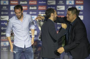 Juanfran, el 'Mono' Burgos y Godín. 