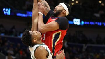 NEW ORLEANS, LA - DECEMBER 13: Anthony Davis #23 of the New Orleans Pelicans makes a shot over Giannis Antetokounmpo #34 of the Milwaukee Bucks at Smoothie King Center on December 13, 2017 in New Orleans, Louisiana.   Chris Graythen/Getty Images/AFP
 == FOR NEWSPAPERS, INTERNET, TELCOS &amp; TELEVISION USE ONLY ==