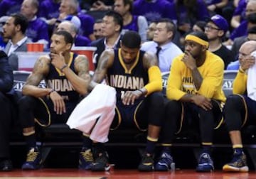 George Hill, Paul George y Ty Lawson.