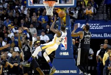 En una noche en la que se homenajeó a Craig Sager, el mítico periodista que lucha contra un cáncer, los Spurs arrasaron liderados por Kawhi y LaMarcus Aldridge y arruinaron el estreno de Kevin Durant con los Warriors.
