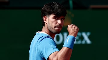 Spain's Carlos Alcaraz celebrates a point against Monaco's Valentin Vacherot during the Monte Carlo ATP Masters Series Tournament semi-final tennis match on Court Rainier III at the Monte-Carlo Country Club in Roquebrune-Cap-Martin, south-eastern France on April 11, 2026. (Photo by Thibaud MORITZ / AFP)