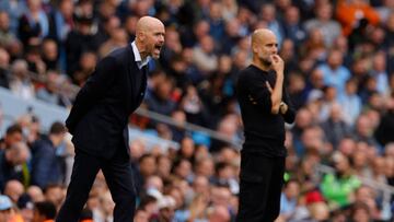 MANCHESTER, ENGLAND - OCTOBER 02: Manager Erik ten Hag of Manchester United and Manager Pep Guardiola of Manchester City watch from the touchling during the Premier League match between Manchester City and Manchester United at Etihad Stadium on October 02, 2022 in Manchester, England. (Photo by Jared Martinez/Manchester United via Getty Images)