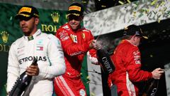 MELBOURNE, AUSTRALIA - MARCH 25:  Race winner Sebastian Vettel of Germany and Ferrari celebrates on the podium during the Australian Formula One Grand Prix at Albert Park on March 25, 2018 in Melbourne, Australia.  (Photo by Charles Coates/Getty Images)