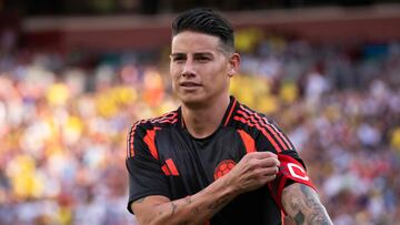 Colombia's forward #10 James Rodriguez adjusts his captain arm band during the international friendly football match between the USA and Colombia at Commanders Field in Greater Landover, Maryland, on June 8, 2024. (Photo by ROBERTO SCHMIDT / AFP)