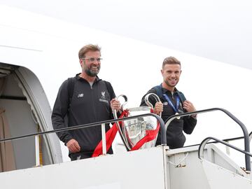 Liverpool arrive back in Liverpool with the Champions League trophy