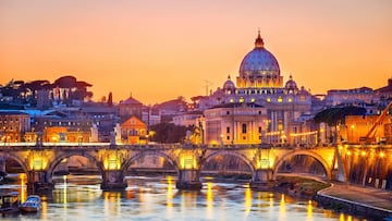 View on Tiber and St. Peter's cathedral at night, Rome